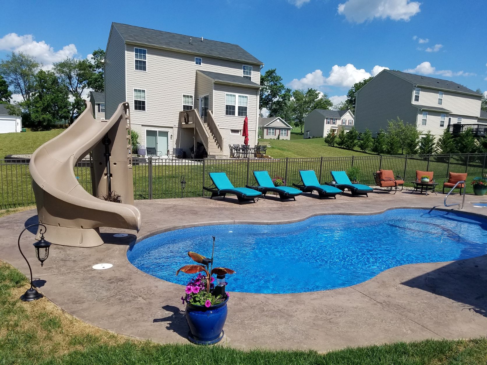 backyard pool with fiberglass