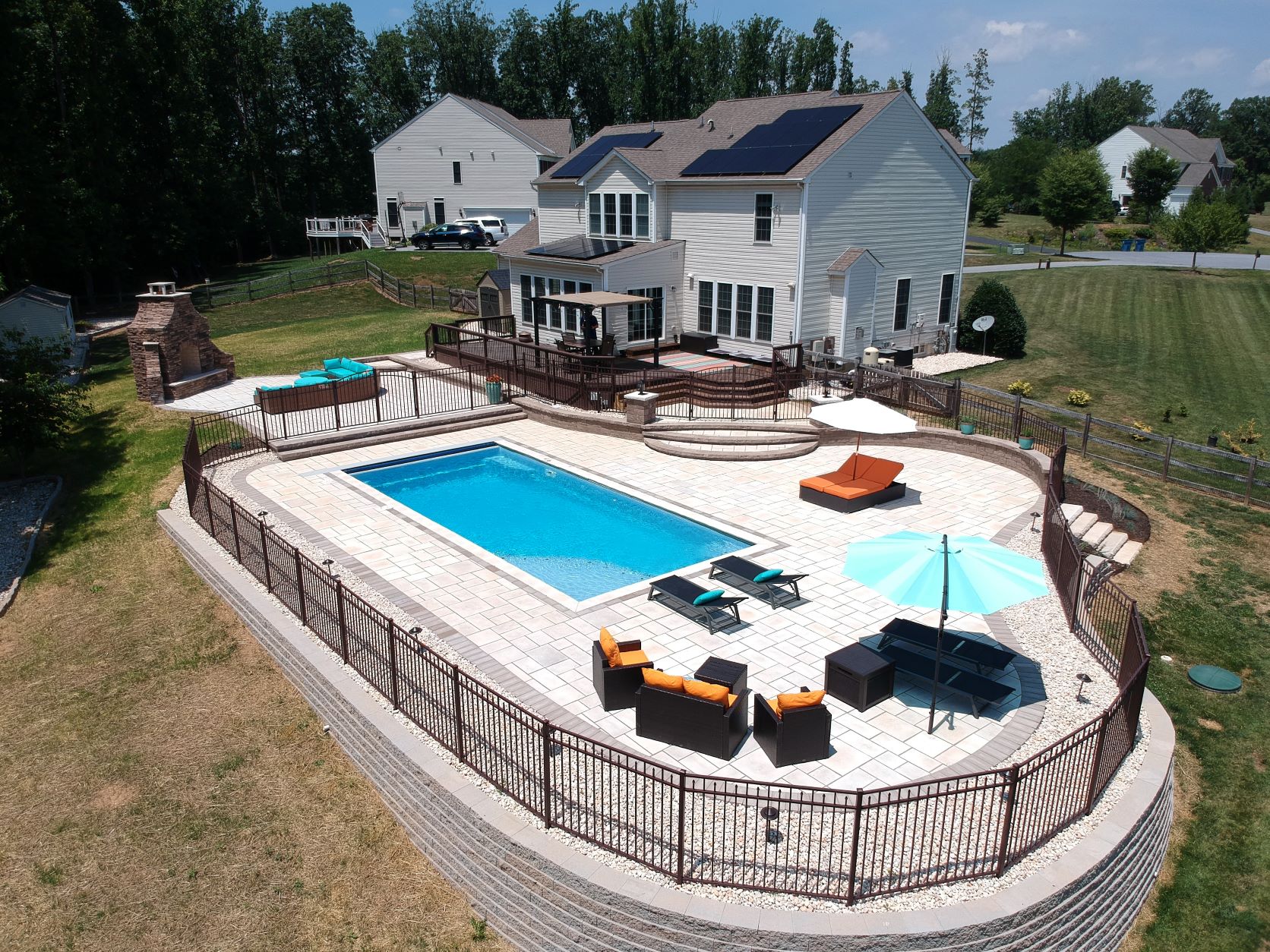 beautiful backyard with a big fiberglass pool